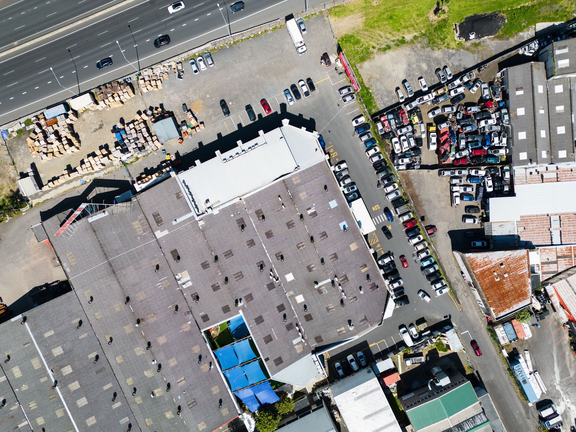 Warehouse overhead view in industrial zone.